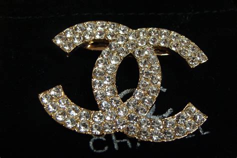 chanel logo brooch price|chanel brooch price.